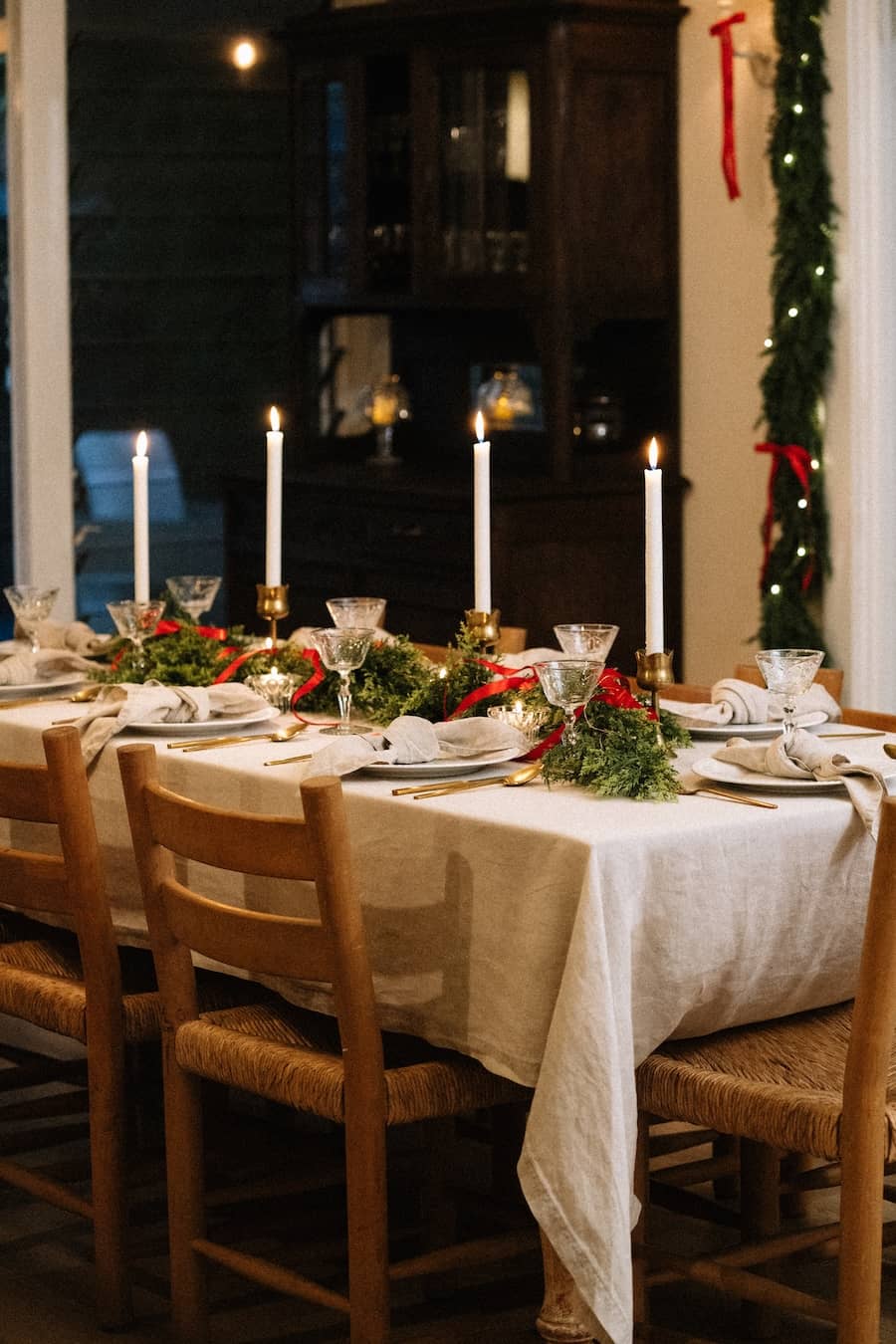 a table set for Christmas dinner